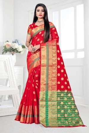 Enhance Your Personality Wearing This Silk Based Saree In Red Color. This Pretty Weaved Saree Is Fabricated On Cotton Silk Paired With Art Silk Fabricated Blouse. Buy Now.