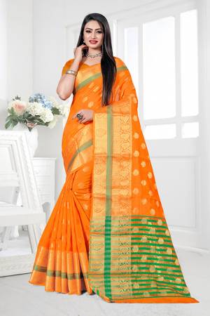 Enhance Your Personality Wearing This Silk Based Saree In Orange Color. This Pretty Weaved Saree Is Fabricated On Cotton Silk Paired With Art Silk Fabricated Blouse. Buy Now.