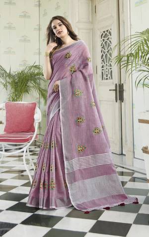 You Will Definitely Earn Lots Of Compliments Wearing This Designer Saree In Pink Color Fabricated On Rich Linen Cotton Fabric. This Pretty Saree Is Light Weight, Durable And Easy To Carry All Day Long. 
