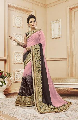 Add This Designer Saree To Your Wardrobe In Pink And Brown Color Paired With Brown Colored Blouse. This Saree Is Fabricated On Georgette And Net Paired With Art Silk And Net Fabricated Blouse. 