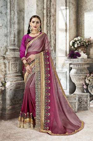 You Will Definitely Earn Lots Of Compliments Wearing This Designer Saree In Lovely Shades Of Pink. This Saree Is Satin Silk Based Paired With art Silk Fabricated Blouse. 