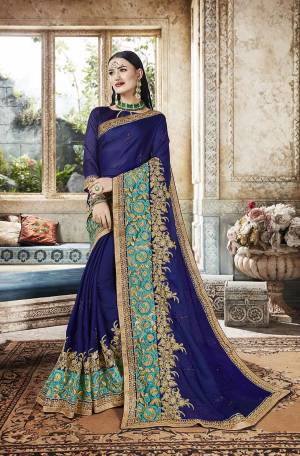 Bright And Visually Appealing Color Is Here With This Designer Saree In Royal Blue Color. This Saree Is Fabricated On Satin Chiffon Paired With art Silk Fabricated Blouse. Buy Now.