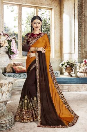 Enhance Your Personality Wearing This Heavy Designer Saree In Brown And Musturd Yellow Color Paired With Brown Colored Blouse. This Saree Is Fabricated On Georgette And Fancy Fabric Paired With Velvet And Georgette Fabricated Embroidered Blouse. Buy This Designer Piece Now.