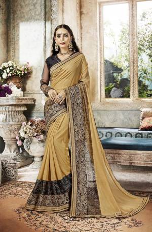 Flaunt Your Rich And Elegant Taste Wearing This Designer Saree In Beige Color Paired With Black Colored Blouse. This Saree Is Fabricated on Dew Drop Georgette Paired with Art Silk And Net fabricated Blouse. Buy Now.