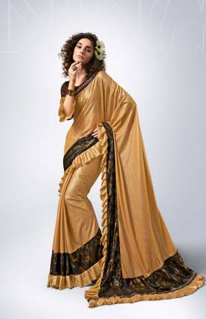 Catch All The Limelight At The Next Party You Attend With This Designer Saree In Golden Color Paired With Dark Brown Colored Blouse. This Saree Is Lycra Based Paired Art Silk Fabricated Blouse. It Has Very Beautiful And Trending Frill Border Pattern. Buy This Designer Saree Now.