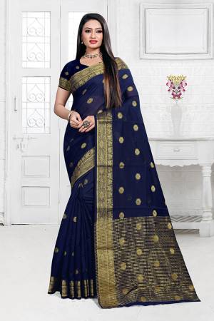 Celebrate This Festive Season Wearing This Designer Silk Based Saree In Navy Blue Color. This Saree Is Fabricated On Cotton Silk Paired with Art Silk Fabricated Blouse Beautified With Weave. It Is Light Weight, Durable And Easy To Carry All Day Long. Buy Now