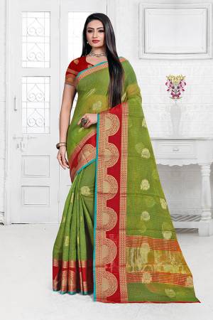 Celebrate This Festive Season Wearing This Designer Silk Based Saree In Green Color. This Saree Is Fabricated On Cotton Silk Paired with Art Silk Fabricated Blouse Beautified With Weave. It Is Light Weight, Durable And Easy To Carry All Day Long. Buy Now