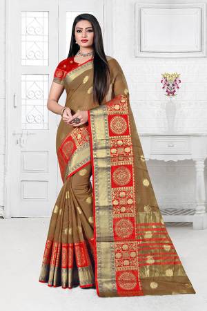 Celebrate This Festive Season Wearing This Designer Silk Based Saree In Light Brown Color. This Saree Is Fabricated On Cotton Silk Paired with Art Silk Fabricated Blouse Beautified With Weave. It Is Light Weight, Durable And Easy To Carry All Day Long. Buy Now