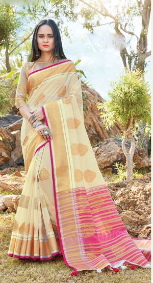 Celebrate This Festive Season With Beauty And Comfort Wearing This Pretty Saree In Cream Color. This Saree And Blouse are Fabricated On Linen Cotton Which Gives A Rich Look To Your Personality. 