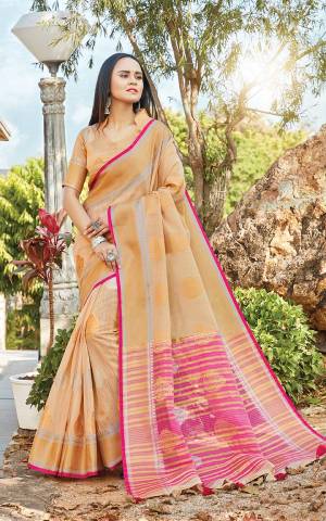 Celebrate This Festive Season With Beauty And Comfort Wearing This Pretty Saree In Beige Color. This Saree And Blouse are Fabricated On Linen Cotton Which Gives A Rich Look To Your Personality. 
