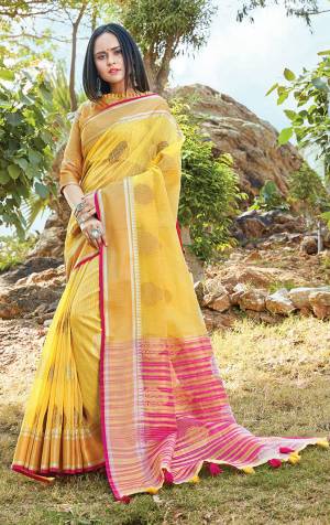 Celebrate This Festive Season With Beauty And Comfort Wearing This Pretty Saree In Yellow Color. This Saree And Blouse are Fabricated On Linen Cotton Which Gives A Rich Look To Your Personality. 