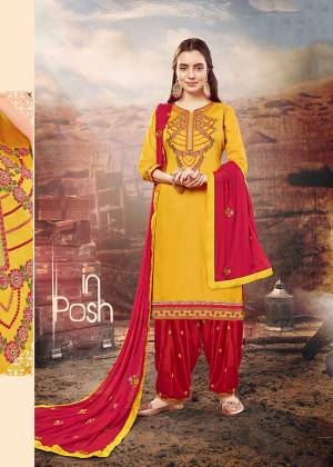 Get Ready For The Upcoming Festive Season With This Designer Patiala Suit In Musturd Yellow Colored Top Paired With Contrasting Red Colored Bottom And Dupatta. Its Top Is Fabricated On Cotton Silk Paired With Rayon Bottom And Chiffon Fabricated Dupatta. It Is Beautified With Embroidery All over. 