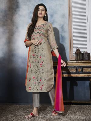 Add This Elegant Shade To Your Wardrobe With This Readymade Designer Straight Suit In Grey Color Paired With Pink And Orange Colored Shaded Dupatta. Its top Is Fabricated On Art Silk Beautified With Embroidery Paired With Cotton Pant and Chiffon Fabricated Dupatta. 