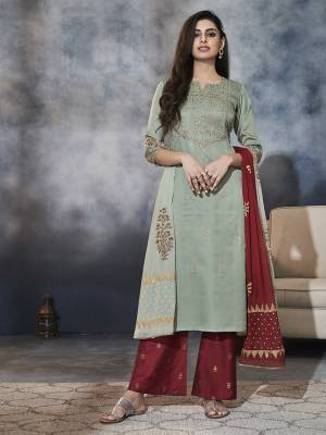 Grab This Pretty Designer Readymade Straight Suit In Teal Grey Colored Top Paired With Maroon Colored Bottom And Maroon And Teal Grey Dupatta. Its Top Is Fabricated On Satin Paired With Art Silk Bottom and Chiffon Fabricated Dupatta. Buy Now .