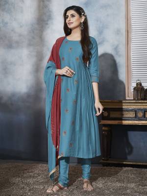Grab This Designer Readymade Suit In Sky Blue In Lovely A-Line Pattern. Its Top And Dupatta Are Muslin Based Paired With Satin Fabricated Chudidar. It Is Light In Weight And Easy To Carry all Day Long. 