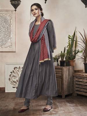 New Shade Is Here To Add Into Your Wardrobe With This Designer Readymade Suit In Dark Grey Color. Its Top and Dupatta Are Muslin Based Paired With Cotton fabricated Pant. Buy This Pretty Suit Now.