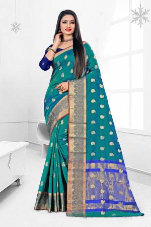 Here Is A Beautiful Designer Silk Based Saree In Blue Color. This Pretty Floral Patterned Saree Is Fabricated On Banarasi Art Silk Paired With Art Silk Fabricated Blouse. Buy This Saree Now.