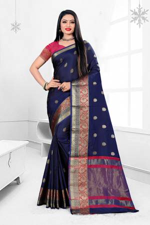 Here Is A Beautiful Designer Silk Based Saree In Navy Blue Color. This Pretty Floral Patterned Saree Is Fabricated On Banarasi Art Silk Paired With Art Silk Fabricated Blouse. Buy This Saree Now.