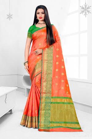 Here Is A Beautiful Designer Silk Based Saree In Light Orange Color. This Pretty Floral Patterned Saree Is Fabricated On Banarasi Art Silk Paired With Art Silk Fabricated Blouse. Buy This Saree Now.