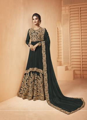 Add This Lovely Designer Floor Length Suit To Your Wardrobe In Pine Green Color. Its Heavy Embroidered Top and Dupatta Are Fabricated on Georgette Paired With Santoon Fabricated Bottom. It Is Beautified With Detailed Coding Embroidery Giving You An Attractive Look. 