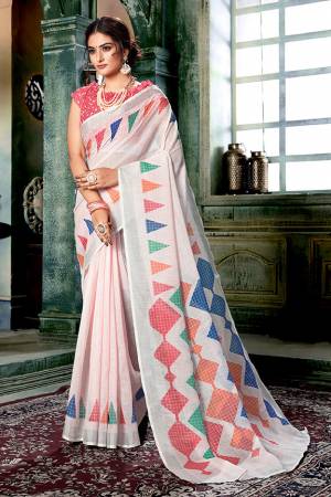 Flaunt Your Rich And Elegant Taste Wearing This Pretty Digital Printed Saree In Off-White And Multi Color Paired With Pink Colored Blouse. This Saree And Blouse Are Fabricated On Linen Cotton Which Gives A Rich Look To Your Personality. 