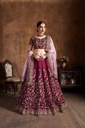 Go With The Lovely Shades Of Pink Wearing This Heavy Designer Lehenga Choli In Magenta Pink Color Paired With Baby Pink Colored Dupatta. This Heavy Embroidered Lehenga Choli Is Fabricated On Art Silk Paired With Net Fabricated Dupatta. Buy This Lovely Piece Now. 