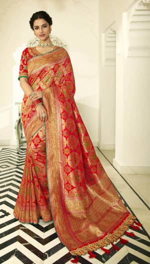 Celebrate This Festive Season In A Lovely Traditional Look With This Heavy Designer Saree In Orange Color Paired With Dark Pink Colored Blouse. This Saree Is Fabricated on Banarasi Art Silk Beautified With Heavy Weave Paired with Art Silk Fabricated Blouse Beautified With heavy Embroidery.