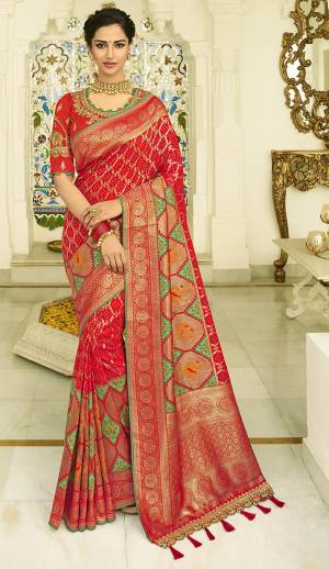 Celebrate This Festive Season In A Lovely Traditional Look With This Heavy Designer Saree In Red Color Paired With Red Colored Blouse. This Saree Is Fabricated on Banarasi Art Silk Beautified With Heavy Weave Paired with Art Silk Fabricated Blouse Beautified With heavy Embroidery.