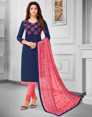 If Those Readymade Suit Does Not Lend You The Desired Comfort Than Grab This Cotton Based Embroidered Dress Material In Navy Blue Colored Top Paired With Contrasting Pink Colored Bottom And Dupatta. Its Pretty Chiffon Dupatta Is Beautified With Resham Embroidery. Get This Stitched As Per Your Desired Fit And Comfort.