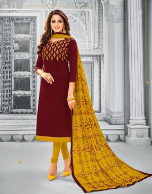 If Those Readymade Suit Does Not Lend You The Desired Comfort Than Grab This Cotton Based Embroidered Dress Material In Maroon Colored Top Paired With Contrasting Musturd Yellow Colored Bottom And Dupatta. Its Pretty Chiffon Dupatta Is Beautified With Resham Embroidery. Get This Stitched As Per Your Desired Fit And Comfort.