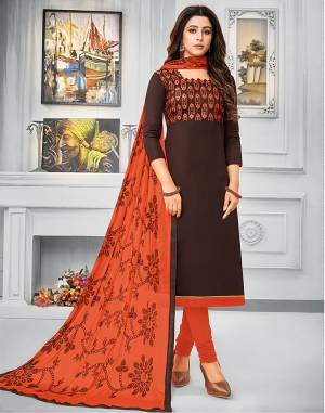 Rich And Elegant Looking Designer Dress Material Is Here For Your Semi-Casual Wear In Brown Colored Top Paired With Rust Orange Colored Bottom And Dupatta. Its Top And Bottom Are Cotton Based Paired With Chiffon Fabricated Dupatta. Buy Now.