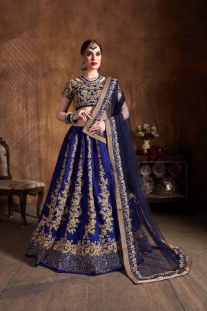 This Wedding Season Be The Most Attractive of All Wearing This Heavy Designer Lehenga Choli In All Over Royal Blue Color. This Heavy All Over Embroidered Lehenga Choli Is Fabricated On Art Silk Paired With Net Fabricated Dupatta. Its Detailed Embroidery Will Give An Attractive Look To Your Personality. 