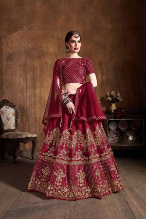 You Will Definitely Earn Lots Of Compliments Wearing This Heavy Designer Lehenga Choli In Dark Pink Color. This Pretty Designer Embroidered Lehenga Choli Is Fabricated On Art Silk Paired With Net Fabricated Dupatta. Buy This Lehenga Choli Now.