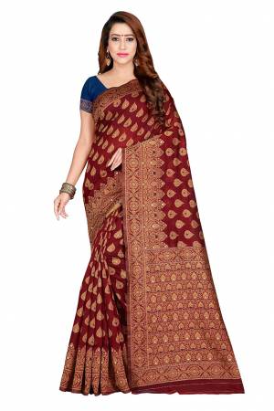 Celebrate This Festive Season With Beauty And Comfort Wearing This Designer Silk Based Saree. This Saree And Blouse Are Fabricated on Banarasi Art Cotton Beautified With Weave. Its Rich Fabric Is Durable , Light Weight And Easy To Carry All Day Long. 