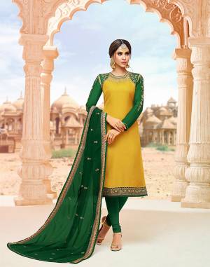 Celebrate This Festive Season Wearing This Heavy Designer Lehenga Suit In Yellow Colored Top Paired With Green Colored Bottom, Lehenga And Dupatta. Its Top Is Fabricated On Satin Georgette Paired With Santoon Bottom, Georgette Fabricated Lehenga And Dupatta. Buy This Lovely Suit With Two Bottoms To Pair As Per The Occasion. 