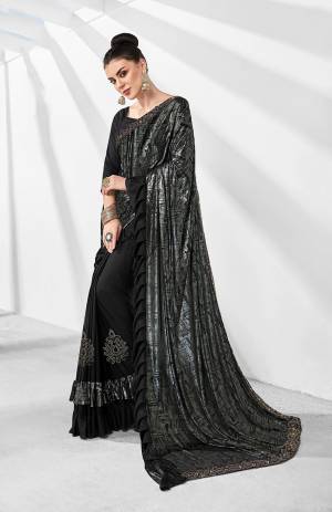 Get Ready For The Next Party At Your Place With This Designer Saree In Black Color Paired With Black Colored Blouse. This Saree Is Lycra Based Paired With Art Silk Fabricated Blouse. Also It Is Light In Weight And Easy To Carry Throughout The Gala