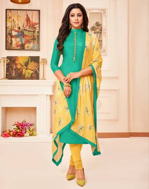 Celebrate This Festive Season With beauty And Comfort Wearing This Designer Straight Suit In Sea Green Color Paired With Contrasting Yellow Colored Bottom And Dupatta. Its Top Is Fabricated on Soft Cotton With Hand Work Paired With Santoon Bottom And Chinon Fabricated Digital Printed Fancy Dupatta. Buy This Dress Material Now.