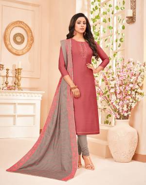 Grab This Pretty Designer Straight Suit In Onion Pink Colored Top Paired With Contrasting Grey Colored Bottom And Dupatta. Its Top Is Fabricated On Tussar Art Silk Beautified With Hand Work Paired With Santoon Bottom And Chanderi Silk Fabricated Heavy Embroidered Dupatta. 