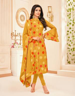 You Will Definitely Earn Lots Of Compliments Wearing This Fancy Designer Suit In Musturd Yellow Color. Its Top Is Fabricated Muslin Paired With Santoon Bottom And Chiffon Fabricated Stone Work Dupatta.
