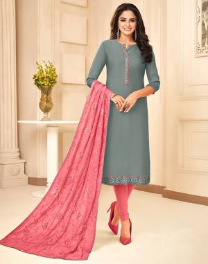 Add This Beautiful Designer Suit To Your Wardrobe In Heavy Dupatta Concept In Grey And Pink color. Its Top Is Fabricated On Tussar Art Silk Paired With Santoon Bottom And Chanderi Silk Fabricated Heavy Embroidered Dupatta. 