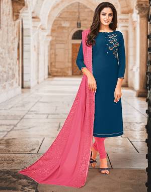 Enhance Your Personality Wearing This Designer Straight Suit In Navy Blue Color Paired With Contrasting Pink Colored Bottom And Dupatta. Its Top Is Fabricated On Muslin Beautified With Hand Work Paired with Santoon Bottom And Chanderi Silk Dupatta. 