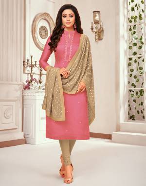 Here Is A Rich Looking Heavy designer Dress Material In Pink And Beige , You can Get This Stitched As Per Your Desired Fit And Comfort. Its Top Is Silk Based Paired With Santoon Bottom And Chiffon Fabricated Heavy Embroidered Dupatta. 