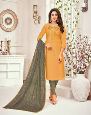 Flaunt Your Rich And Elegant Taste Wearing This Designer Straight Suit In Musturd Yellow Color Paired With Grey Colored Bottom And Dupatta. Its Pretty Elegant Top Is Fabricated on Tussar art Silk Paired With Santoon Bottom And muslin Fabricated Dupatta. 