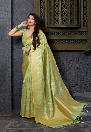 Proper Traditional Looking Designer Silk Based Saree Is Here In Light Green Color Paired With Light Green Colored Blouse. This Saree And Blouse Are Fabricated On Banarasi Art Silk. Buy Now.