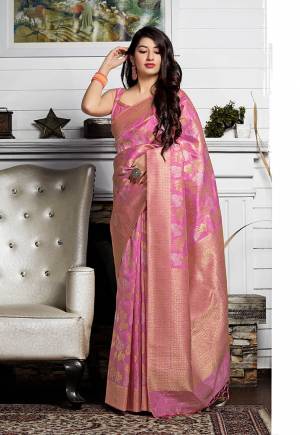 Grab This Designer Silk Based Bright Colored Saree In Pink Color Paired With Pink Colored Blouse. This Saree And Blouse Are Fabricated On Banarasi Art Silk Beautified With Weave All Over.