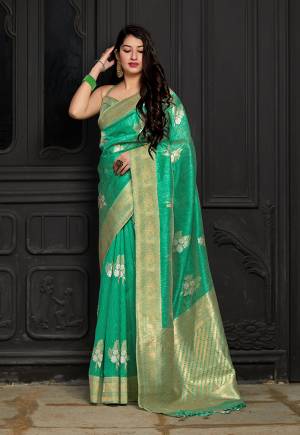For A Bold And Beautiful Look, Grab This Designer Saree In Green?Color Paired With Green Colored Blouse. This Saree And Blouse Are Banarasi Art Silk Based Beautified With Attractive Weave All Over. Buy Now