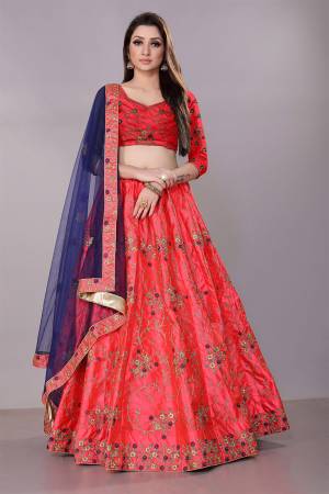 Get Ready For The Upcoming Wedding Season With This Heavy Designer Lehenga Choli In Dark Pink Color Paired With Contrasting Royal Blue Colored Dupatta. This Pretty Heavy Embroidered And Attractive Lehenga Choli Is Fabricated on Satin Silk Paired With Net Fabricated Dupatta. Its Detailed Embroidery And Color Pallete Will earn You Lots Of Compliments From Onlookers.