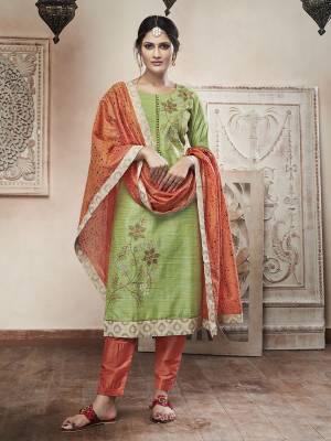 Celebrate This Festive Season In This Beautiful Readymade Designer Suit In Green Color Paired With Contrasting Orange Colored Bottom And Dupatta. This Suit In Chanderi Silk Based Which Gives A Rich Look To Your Personality. 