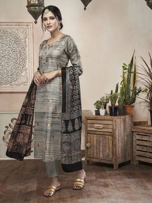 Rich And Elegant Looking Designer Readymade Straight Suit IS Here In Grey Color Paired With Black Colored Dupatta. Its Top IS Fabricated On Art Silk Paired With Satin Silk Bottom And Art Silk Dupatta. 