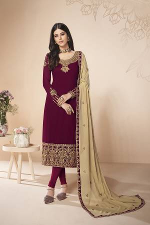Here Is A Rich And Elegant Looking Designer Straight Suit In Maroon Color Paired With Cream Colored Dupatta. Its Embroidered Top And Dupatta Are Fabricated On Georgette Paired With Santoon Fabricated Bottom. Buy This Semi-Stitched Suit Now.